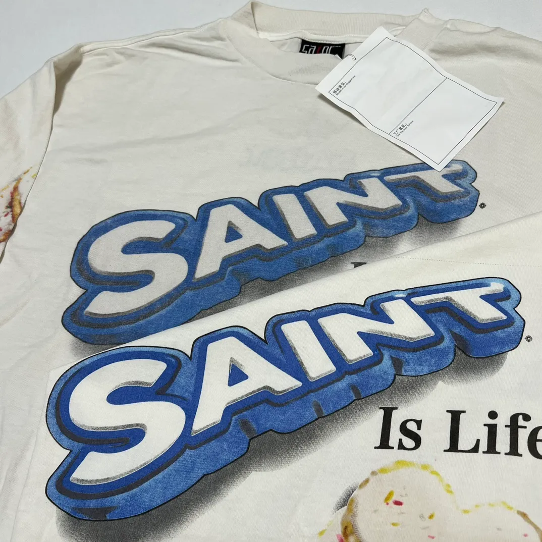 Printing proofing SAINT Mxxxxxx HEART COOKIES L/S TEE/WHT Love Oreo printed long sleeves Off-white S-XL Customized co-branded main mark/wash mark Correct version Ready-made garments washed and distressed Full of VINTAGE feeling Top-notch printing technology Perfect restoration
